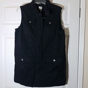 A New Day black vest